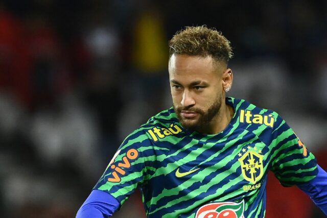 Brazil's forward Neymar warms up before a friendly football match between Brazil and Tunis