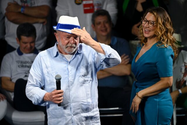 Former Brazilian president and current candidate Luiz Inacio Lula da Silva appears with hi