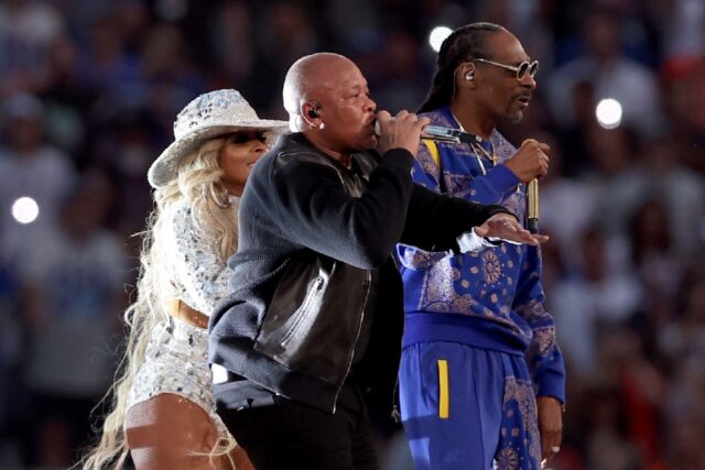 Dr. Dre (centre) performs alongside Mary J. Blige and Snoop Dogg during the 2022 Super Bow