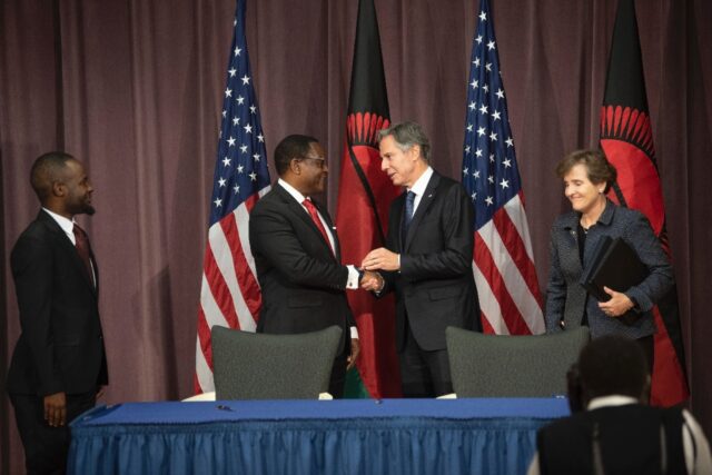 Malawian President Lazarus Chakwera shakes hands with US Secretary of State Antony Blinken