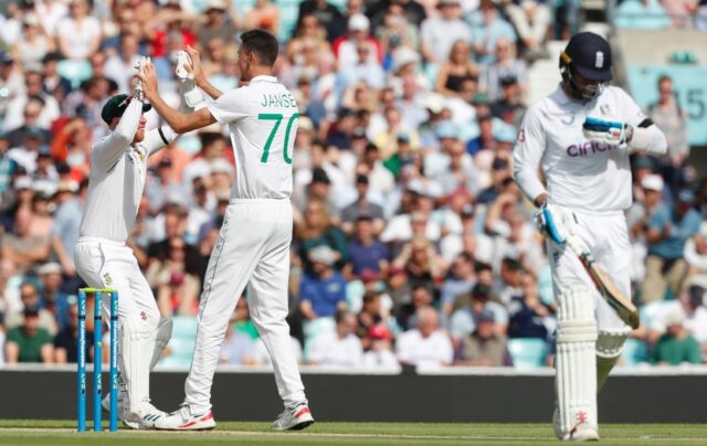 End of the innings - South Africa's Marco Jansen (C) celebrates with wicketkeeper Kyle Ver