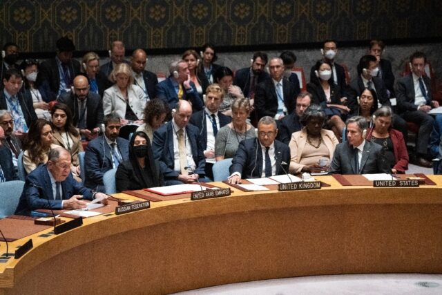 Russian Foreign Minister Sergei Lavrov (left) speaks at a Security Council session on Ukra