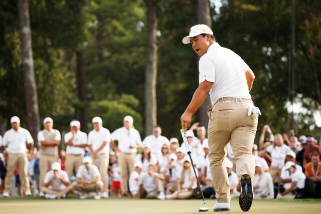 South Korea's Kim Joo-hyung screams after sinking the match-winning putt on the 18th green
