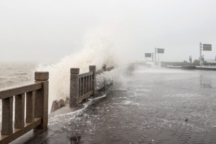 Waves generated by Typhoon Muifa break along the coast in Lianyungang in China's eastern J