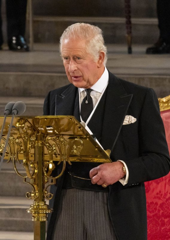 Britain unveils King Charles III's royal insignia, postage stamp