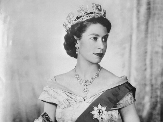 Portrait of Queen Elizabeth II of England in 1952 wearing tiara and ribbon of the order of the Garder.