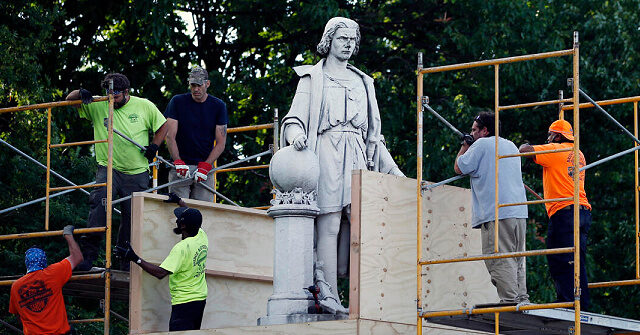 Box Covering Columbus Statue Painted with Colors of Italian Flag - Vimarsana News
