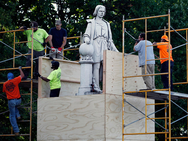 Box Covering Columbus Statue Painted with Colors of Italian Flag - Vimarsana News