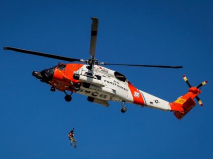 Two Million Still Without Power in Florida After Hurricane Ian A U.S. Coast Guard helicopt