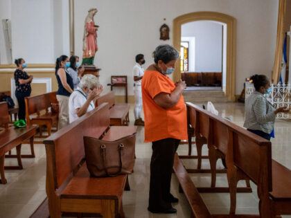 Faithful attend a Mass at the Cathedral in Matagalpa, Nicaragua, Friday, Aug. 19, 2022. Nicaraguan police on Friday raided the residence of Matagalpa Bishop Rolando Alvarez, detaining him and several other priests in an escalation of tensions between the Catholic Church and the government of Daniel Oretga. (AP Photo/Inti Ocon)