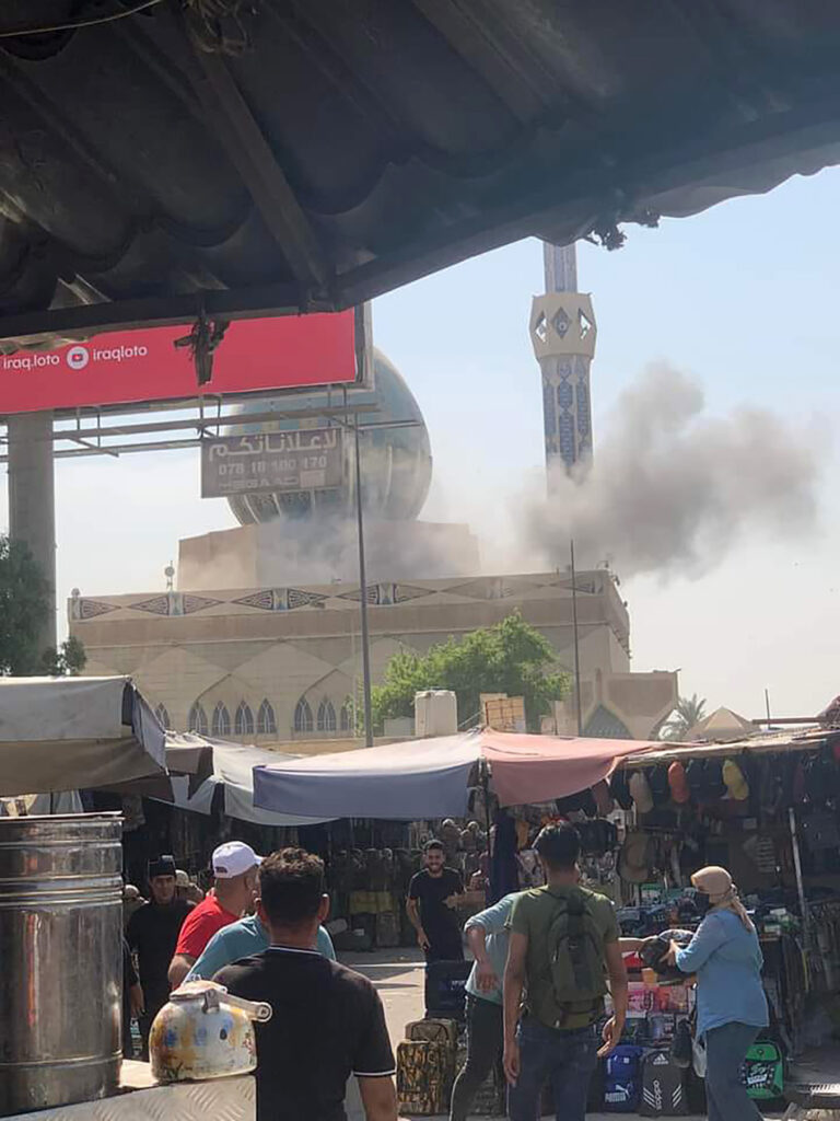 This photo provided by Security Media Cell, shows smoke rising after a rocket attack in Baghdad, Iraq, Thursday, Oct.13, 2022. At least nine rockets targeted Iraq's parliament inside the heavily fortified Green Zone on Thursday ahead of a much-anticipated session to resolve a political crisis, Iraq's military said. (Security Media Cell via AP)