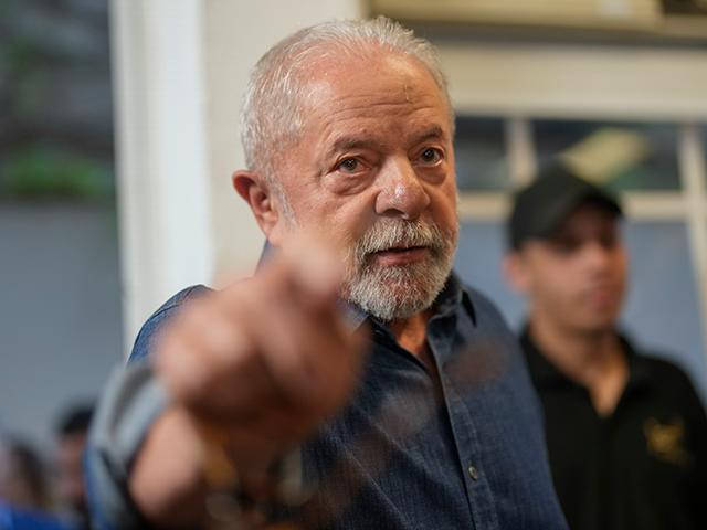Brazil's former President Luiz Inacio Lula da Silva, who is running for reelection, arrives for a meeting with Mayors in Sao Paulo, Brazil, Wednesday, Oct. 26, 2022. Da Silva will face Brazilian President Jair Bolsonaro in a presidential runoff on Oct. 30. (AP Photo/Andre Penner)