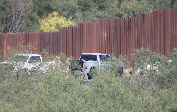Texas Department of Public Safety troopers and National Guard officials process the scene where a Guardsman died from an apparent self-inflicted gunshot wound on September 2, 2022. (Randy Clark/Breitbart Texas)
