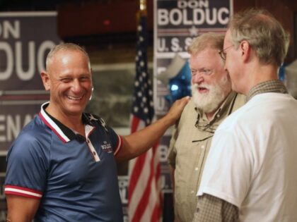 New Hampshire Republican U.S. Senate candidate Don Bolduc chats with supporters during a primary night campaign gathering, Tuesday Sept. 13, 2022, in Hampton, N.H. (Reba Saldanha/AP)