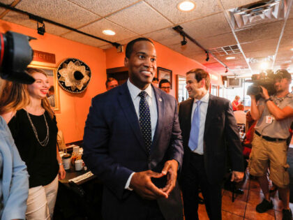 DETROIT, MI - AUGUST 13: Michigan GOP U.S. Senate candidate John James (left) campaigns with the help of Sen. Marco Rubio (R-FL) (right) at Senor Lopez Restaurant August 13th, 2018 in Detroit, Michigan. James, an Iraq war veteran and businessman who has President Donald Trump's endorsement, will be running against …