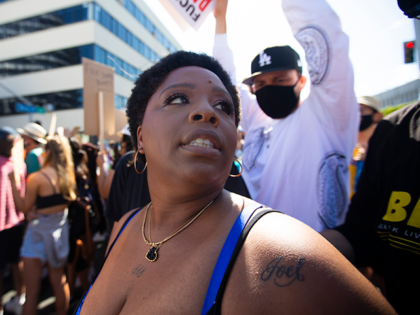 Patrisse Cullors is one of the three co-founders of the Black Lives Matter movement. She participated in the peaceful march in Hollywood, CA today Sunday June 7, 2020. Thousands of people participated in todays peaceful protest against police sparked by the death of George Floyd. (Francine Orr/ Los Angeles Times …