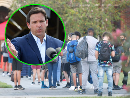 Florida Governor Ron DeSantis speaks in a neighborhood impacted by Hurricane Ian at Fisher