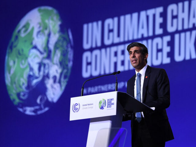 Britain's Chancellor of the Exchequer Rishi Sunak delivers a speech at the opening of Finance Day at the COP26 UN Climate Summit in Glasgow on November 3, 2021. - Sunak is to announce plans to make Britain the world's first net zero financial services centre by 2050, the Treasury said. …