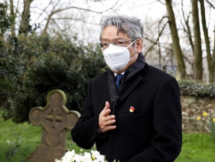 Zheng Xiyuan, Chinese Consul General in Manchester, pays tribute to the life and legacy of Macfarlane, in front of her tombstone in Cheshire, Britain, April 3, 2022. The late translator of the first English version of the Communist Manifesto, Helen Macfarlane, was commemorated by members of the British Communist Party …