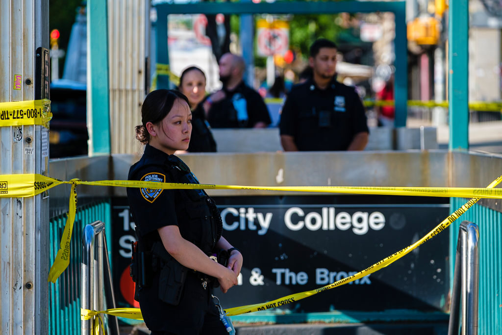 File/NYPD detectives and members of the Crime Scene Unit collect evidence at the City College West 137th Street subway station after a 14 year old was fatally stabbed, Saturday, July 9, 2022. (Jeff Bachner for NY Daily News via Getty Images)