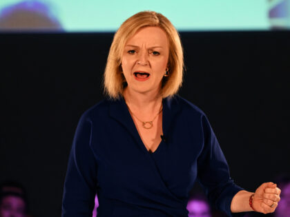 CARDIFF, WALES - AUGUST 03: UK Foreign Secretary Liz Truss speaks during a Conservative party membership hustings at the All Nations Centre on August 3, 2022 in Cardiff, Wales. Rishi Sunak and Liz Truss are holding hustings around the UK for Conservative party members as they vie to become their …