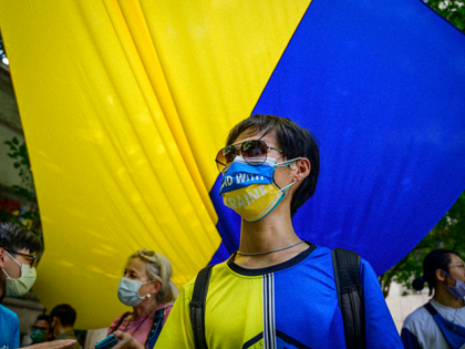 A young Taiwanese dressed with the Ukrainians national colours participate at the Taiwans celebration of Ukraine Independence Day. As Taiwan has a very tiny Ukrainians community, the celebration took part more in sign of protest against Russian invasion of Ukraine that started on February 24th. (Photo by Alberto Buzzola/LightRocket via …