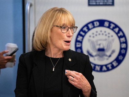 Sen. Maggie Hassan, D-N.H., arrives in the Capitol via the Senate subway for a vote on Thu