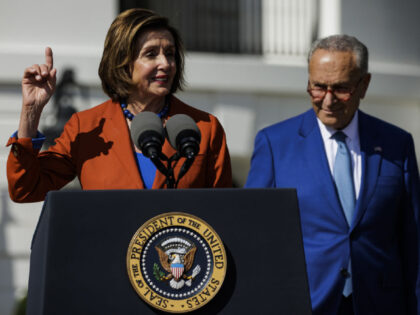 US House Speaker Nancy Pelosi, a Democrat from California, left, speaks alongside Senate Majority Leader Chuck Schumer, a Democrat from New York, during an Inflation Reduction Act event on the South Lawn of the White House in Washington, D.C., US, on Tuesday, Sept. 13, 2022. President Biden is trying to …