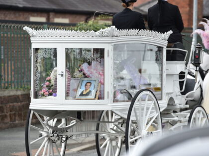 Olivia Pratt-Korbel's coffin leaves St Margaret Mary's Church in Knotty Ash, Liverpool after her funeral. The nine-year-old girl was shot at her home in Dovecot, Liverpool. Picture date: Thursday September 15, 2022. (Photo by Peter Powell/PA Images via Getty Images)