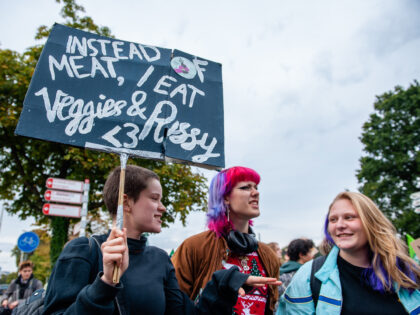 ARNHEM, GELDERLAND, NETHERLANDS - 2022/09/23: A woman is seen holding a placard in support of veganism during the demonstration. Students and young people coming from all parts of the country gathered in the Dutch city of Arnhem to call for action on the demands of Indigenous, Black, and other marginalized …