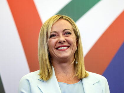 Giorgia Meloni, leader of the Brothers of Italy party, reacts at the party's general