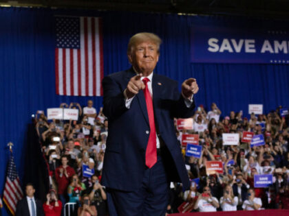 WARREN, MI - OCTOBER 01: Former President Donald Trump waves to the crowd during a Save Am
