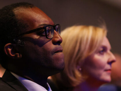 Kwasi Kwarteng, UK chancellor of the exchequer, left, and Liz Truss, UK prime minister, attend the Conservative Party's annual autumn conference in Birmingham, UK, on Sunday, Oct. 2, 2022. Truss acknowledged her UK government mishandled the announcement on unfunded tax cuts which triggered a week of turmoil in financial markets, …