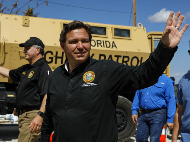 Ron DeSantis, governor of Florida, waves as he arrives to a news conference in Matlacha, F