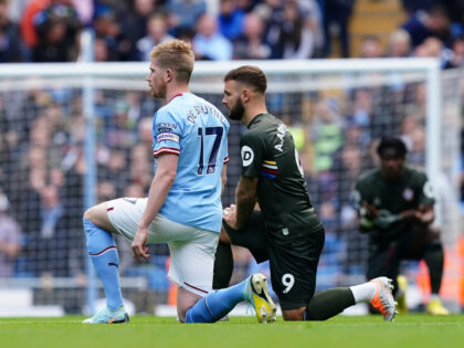 Manchester City's Kevin De Bruyne (left) and Southampton's Adam Armstrong take the knee to support the No Room For Racism campaign before the Premier League match at Etihad Stadium, Manchester. Picture date: Saturday October 8, 2022. (Photo by Martin Rickett/PA Images via Getty Images)