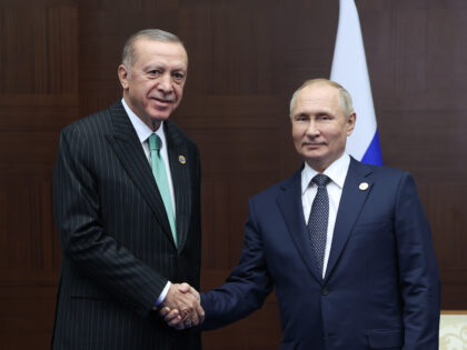 ASTANA, KAZAKHSTAN - OCTOBER 13: Turkish President, Recep Tayyip Erdogan (L) meets Russian President Vladimir Putin (R) on the sidelines of the Conference on Interaction and Confidence Building Measures in Asia (CICA) in Astana, Kazakhstan on October 13, 2022. (Photo by Murat Kula/Anadolu Agency via Getty Images)