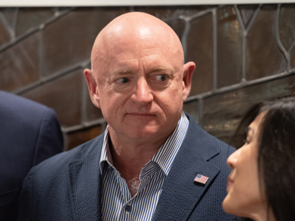 Sen. Mark Kelly (D-AZ) take a group photo at Handmaker Jewish Services for Aging on October 13, 2022 in Tucson, Arizona. Sen. Mark Kelly is campaigning for re-election against far-right, Trump-endorsed Republican candidate Blake Masters. (Photo by Rebecca Noble/Getty Images)