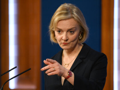 LONDON, ENGLAND - OCTOBER 14: Britain's Prime Minister Liz Truss attends a press conference in the Downing Street Briefing Room on October 14, 2022 in London, England. After just five weeks in the job, Prime Minister Liz Truss has sacked Chancellor of The Exchequer Kwasi Kwarteng after he delivered a …