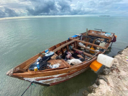 A wooden Cuban migrant boat is tied to a sea wall in the Fills area of Indian Key in the F