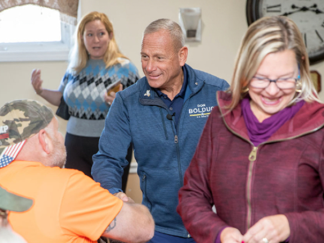 DERRY, NH - OCTOBER 15: Republican senate nominee Don Bolduc shakes hands with attendees during a campaign event on October 15, 2022 in Derry, New Hampshire. Bolduc, and Army General who won the GOP primary will take on Sen. Maggie Hassan (D) in November. (Photo by Scott Eisen/Getty Images)
