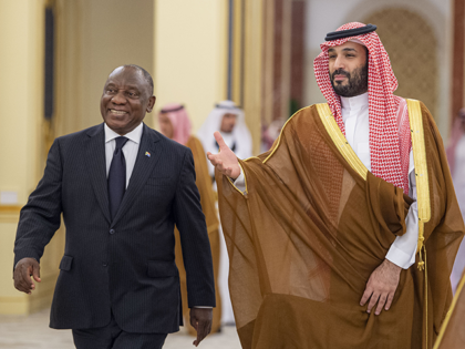 President of South Africa Cyril Ramaphosa (L) is welcomed by Crown Prince of Saudi Arabia, Mohammed bin Salman Al Saud (R) in Riyadh, Saudi Arabia on October 15, 2022. (Photo by Royal Court of Saudi Arabia/Handout/Anadolu Agency via Getty Images)