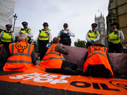Just Stop Oil activists protesting outside the Department for Business, Energy & Industrial Strategy in Victoria Street, central London. Picture date: Monday October 17, 2022. (Photo by Victoria Jones/PA Images via Getty Images)