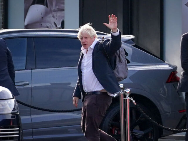 Former Prime Minister Boris Johnson arrives at Gatwick Airport in London, after travelling