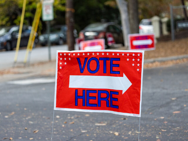 ATLANTA, GEORGIA - OCTOBER 22: A voting sign is seen outside early voting locations in Ful