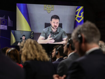 BERLIN, GERMANY - OCTOBER 25: Volodymyr Zelenskyy President of Ukraine delivers a video speech during the international conference of experts for reconstruction in Ukraine on October 25, 2022 in Berlin, Germany. The German government is hosting the conference that is bringing together political and world finance leaders to set groundwork …