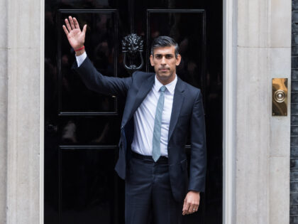 LONDON, UNITED KINGDOM - OCTOBER 25: Britain's newly appointed Prime Minister Rishi Sunak waves to members of the media before entering 10 Downing Street after delivering his first speech as prime minister in London, United Kingdom on October 25, 2022. Rishi Sunak has become UK's 57th prime minister, and the …