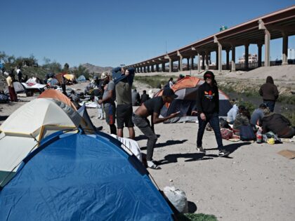 CIUDAD JUAREZ, MEXICO - OCTOBER 26: The undocumented people who waiting to cross the US border, camp in front of the US Border Patrol operations post across the Rio Bravo River in Ciudad Juarez, Mexico on October 26, 2022. (Photo by Christian Torres/Anadolu Agency via Getty Images)