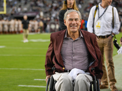 Texas Governor Greg Abbott smiles on the sideline before the football game between the Ole Miss Rebels and Texas A&M Aggies at Kyle Field on October 29, 2022 in College Station, Texas. (Photo by Ken Murray/Icon Sportswire via Getty Images)