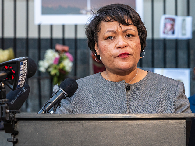New Orleans Mayor LaToya Cantrell speaks at a COVID-19 memorial service outside the gates