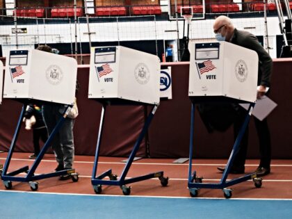 NEW YORK, NEW YORK - NOVEMBER 02: People visit a voting site at a YMCA on Election Day, November 02, 2021 in the Brooklyn borough of New York City. Over 30,000 New Yorkers have already cast their ballots in early voting for a series of races including the race for …